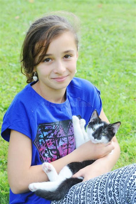 Young Girl Playing With Her Cat Stock Image Image Of Tenderness Girl