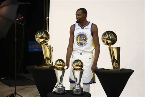 Kevin Durant Of The Golden State Warriors Poses With Two Larry O Brien Nba Championship Trophies