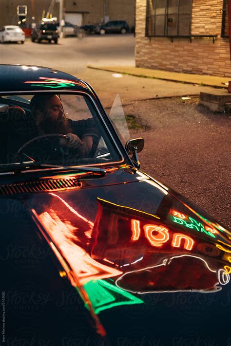 «Male Driving Classic Vintage Retro Car At Night Under Neon Lights In