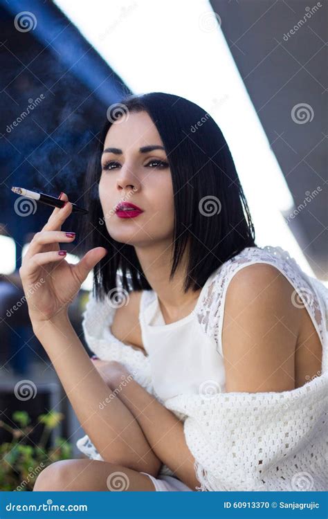 Young Woman Smoking Cigarette Stock Photo Image Of Confidence