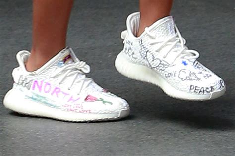 North West Wore Customized Yeezys While Out In New York City Photos