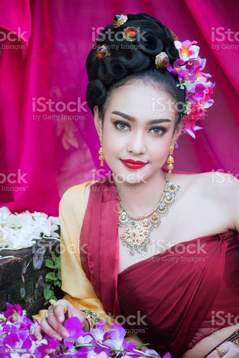 Beautiful Thai Girl In Traditional Dress Costume In Choeng Tha As Thai Temple Where Is The