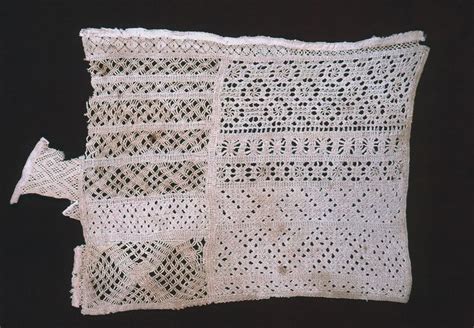 Drawnwork In Several Different Designs Arranged In Two Panels Stitches