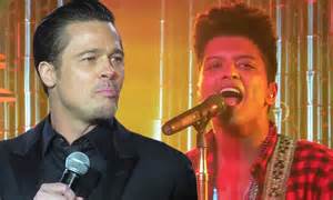 Brad Pitt Shakes His Tambourine Like A Sex Machine Onstage With Bruno