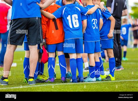 Children Soccer Team Kids Standing Together On The Pitch Youth