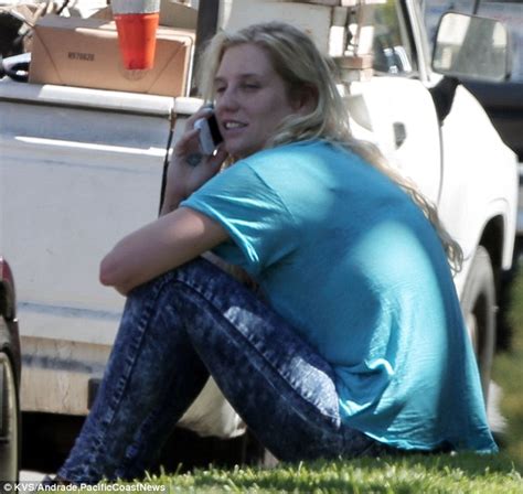 Kesha Displays Bizarre Behaviour As She Takes A Nap On The Grass Verge