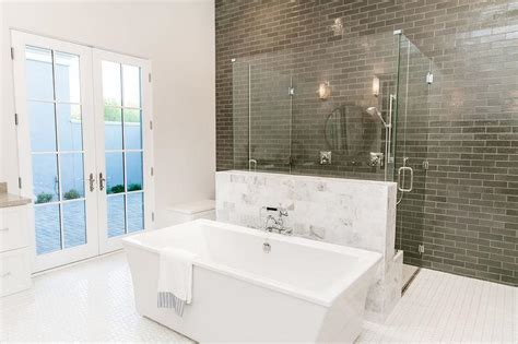 I've already recommended a walk in tub to many of my friends. Freestanding Tub in Front of Glass Walk In Shower ...