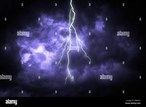 Lightning Strike On The Dark Cloudy Sky Stock Photo Alamy