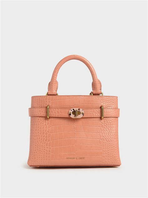 163 people have already reviewed charles & keith. Peach Croc-Effect Turn-Lock Tote Bag | CHARLES & KEITH SG