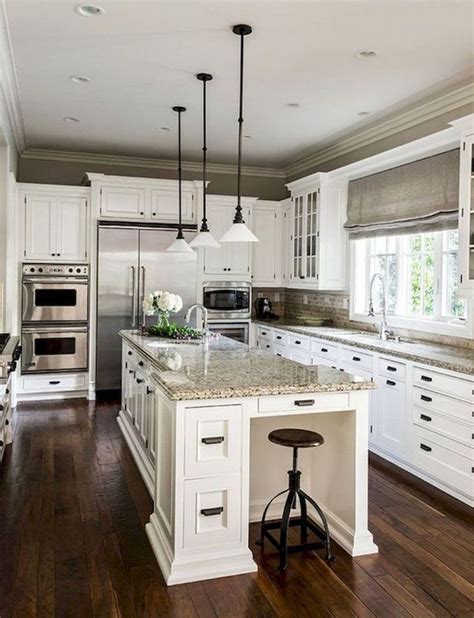The antique accessories really support the antique kitchen cabinets. Best Off White kitchen Cabinets Design Ideas (14) #beautifulkitchendesignsphotos | Traditional ...
