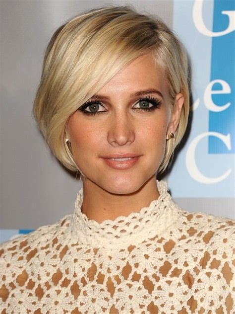 new twist on a short hair classic long side swept bangs add softness and accentuate your eyes