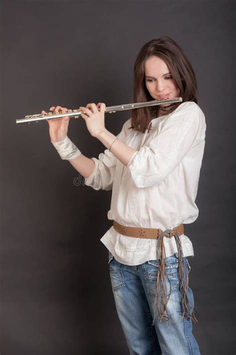 Portrait Of A Woman Playing The Flute Stock Photo Image Of Person Caucasian