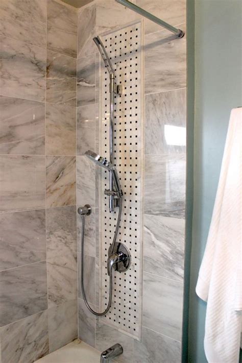shower detail of renovated bathroom featured on episode 101 of hgtv s power broker marble