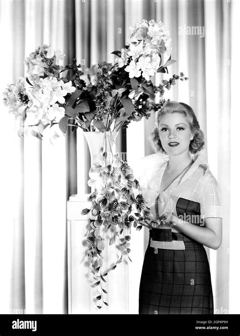 navy wife claire trevor in a checked mousseline de soie dinner frock with a white yoke 1935