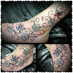 She doesn't want it now though, changed her mind, wants a ankle charm tattoo instead or something. Daisy Chain on Foot | tattoos | Daisy tattoo designs ...