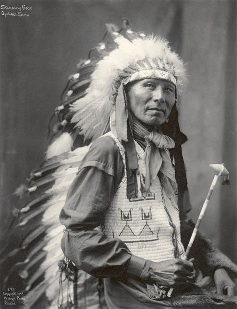 Standing Bear Oglala Lakota Wearing A Long Feathered Headdress And