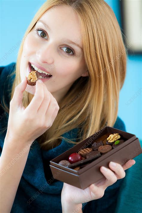 Woman Eating Chocolate Stock Image C0331822 Science Photo Library