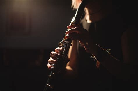 Free Photo Woman Playing A Clarinet In Music Babe