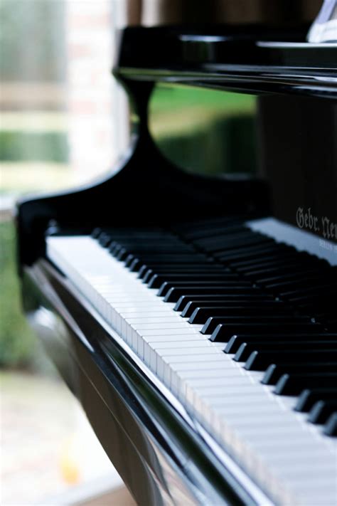 Black And White Piano In Close Up Photography Photo Free Piano Image