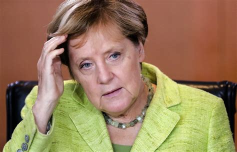 angela merkel profile the eu s most powerful leader is not a liberal hero she s a walking