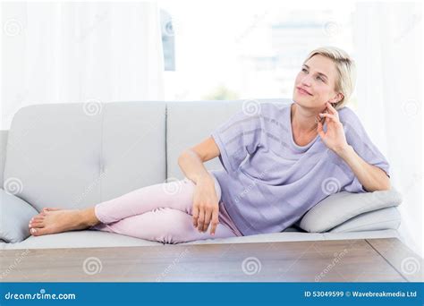 Pretty Blonde Woman Relaxing On The Couch Stock Image Image Of Happy