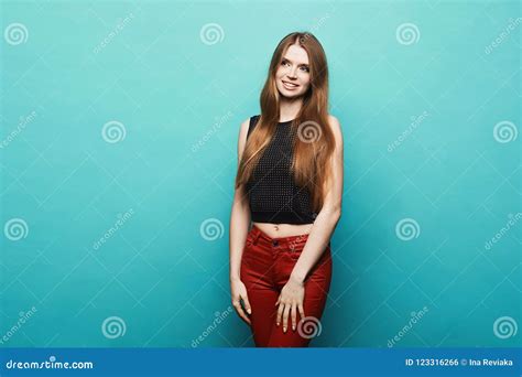 fashionable and beautiful blonde model girl with perfect body in black stylish t shirt and in