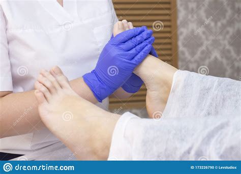 Foot Massage In Spa Salon Closeup Foot Massage Relax Skin Care Stock