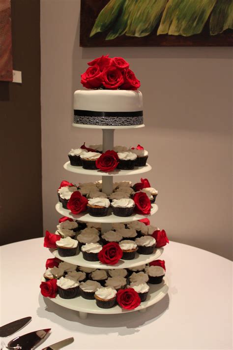 Red White And Black Wedding Cake And Cupcakes