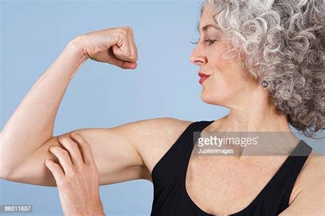 Older Woman Flexing Photos Et Images De Collection Getty Images