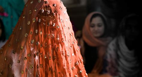 A Traditional Pakistani Bride In Ghunghat Before Her Nikkah At Badshahi