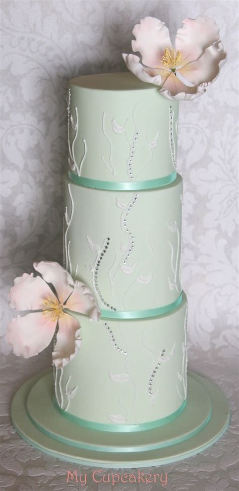Mint Green Fondant With Simple Flowers Some Bling And Royal Icing