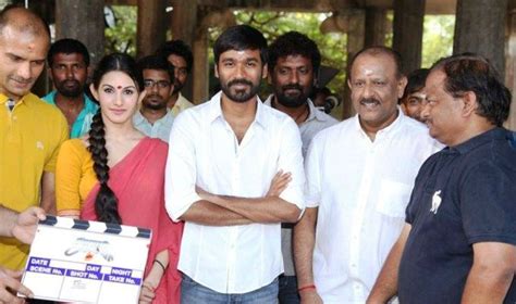 Anand made his movie debut as a cinematographer in the malayalam movie thenmaavin kombath for which he had won a national award. Dhanush, Amyra Dastur, Director KV Anand at Anegan movie ...