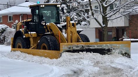 Snow Removal Cat Loader Plowing Heavy Snow Youtube