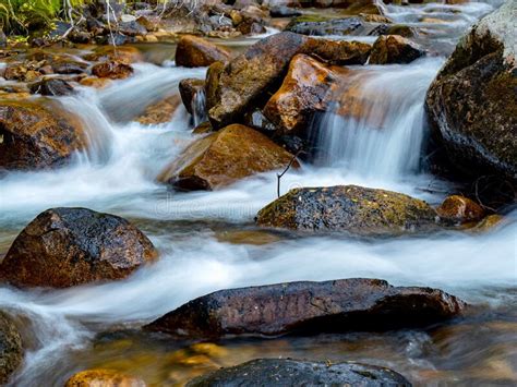 High Mountain Creek With Water Flowing Over Rocks Stock Photo Image