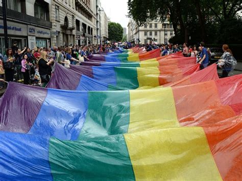 pride in london parade sees thousands defy rain to celebrate the lbgtq