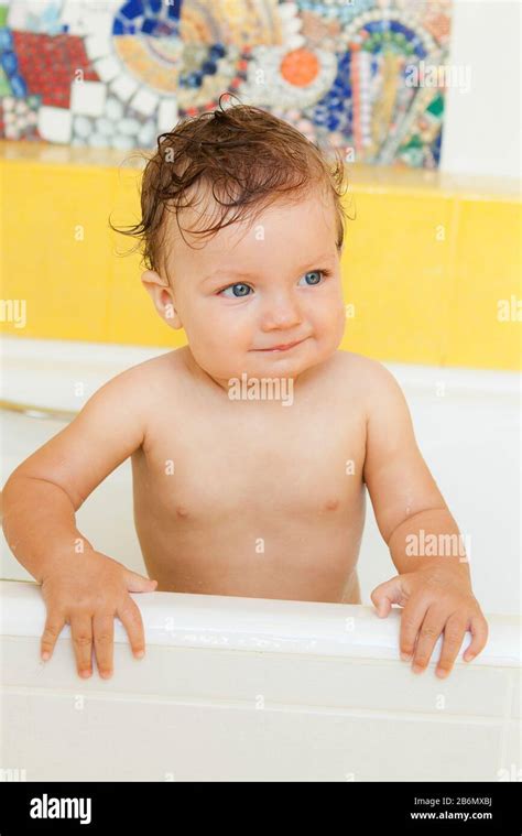 Happy Baby Taking A Bath Laughing And Playing Smiling Kid With Foam