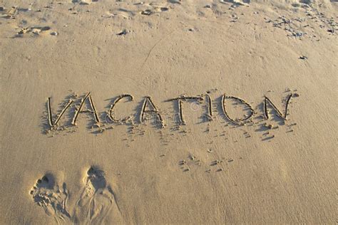 Word Vacation Wrote On The Sand Against Background Message Says Stock