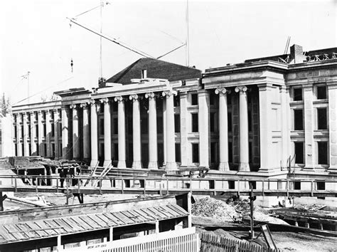 A Photo Series Showing The Construction Of The Treasury Building In The