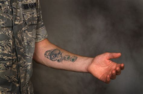 The service is axing its 25 percent rule, which prohibits tattoos that cover more than. air-force-review-its-tattoo-policy