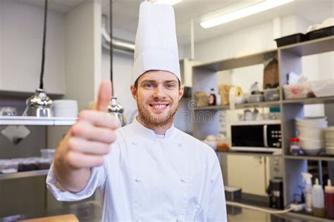Happy Chef At Restaurant Kitchen Showing Thumbs Up Stock Image Image