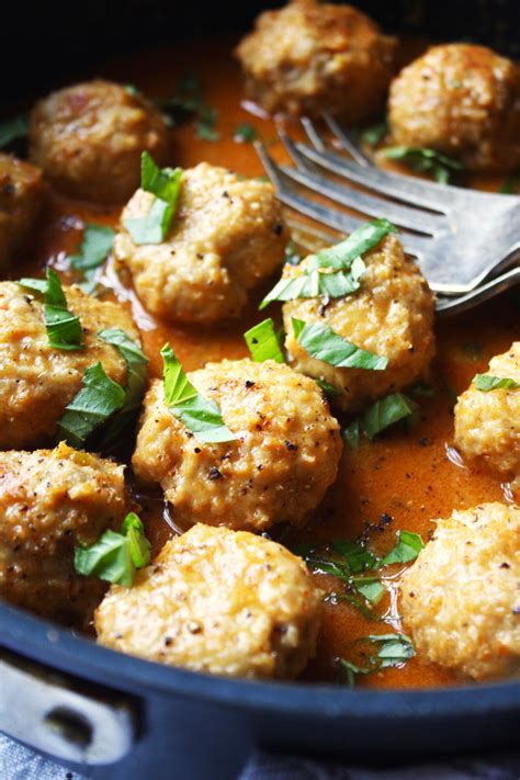 This easy weeknight dinner is loaded with veggies & protein, and is perfect for meal prep! Chicken Meatballs with Thai Coconut Curry Sauce