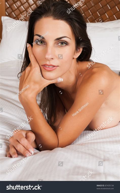 Beautiful Slender Brunette Lying Topless Bed Stock Photo