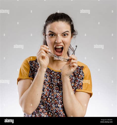 Funny Portrait Of A Mad Woman Stock Photo Alamy