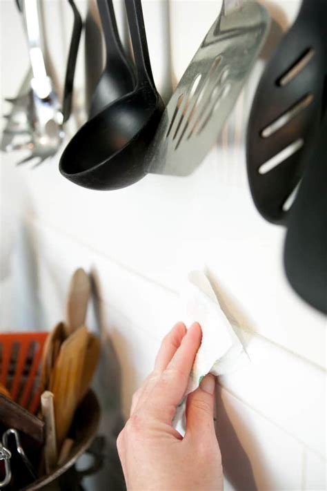First, thoroughly dust the wood kitchen cabinet surface with a soft or microfiber cloth. How To Clean Greasy Kitchen Walls, Backsplashes, and Cupboards | Kitchen wall, Cleaning ...