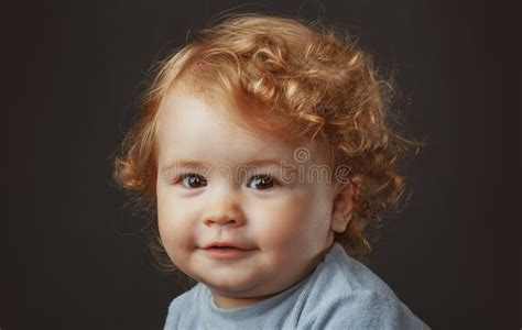 Baby Portrait Close Up Head Of Cute Child Isolated On Black Studio