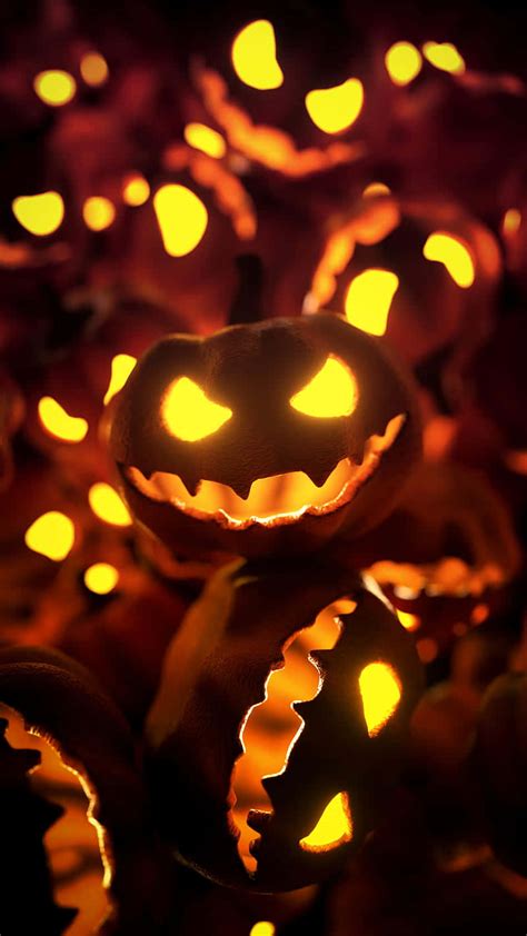 Download Carved Pumpkins Evil Smiles Halloween Wallpaper
