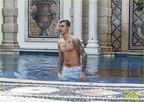 justin bieber goes shirtless for a swim at the versace mansion photo 3528461 justin bieber