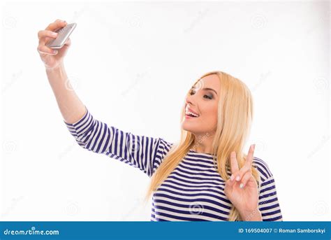 Happy Smiling Girl Making Selfie And Gesturing With Two Fingers Stock Image Image Of Enjoy