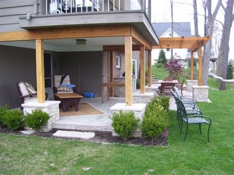 Patio decorating is a great way to make your outdoor space more appealing. Caledonia Outdoor Kitchen and Patio - Signature Outdoor Concepts | Patio under decks, Patio ...