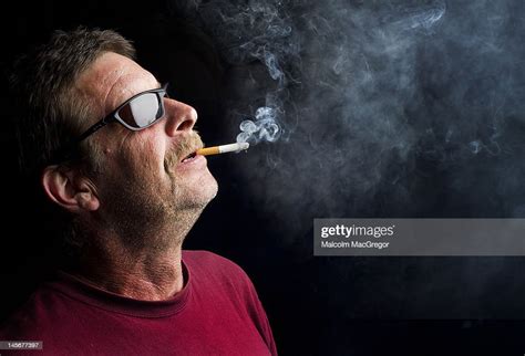 Man Smoking High Res Stock Photo Getty Images